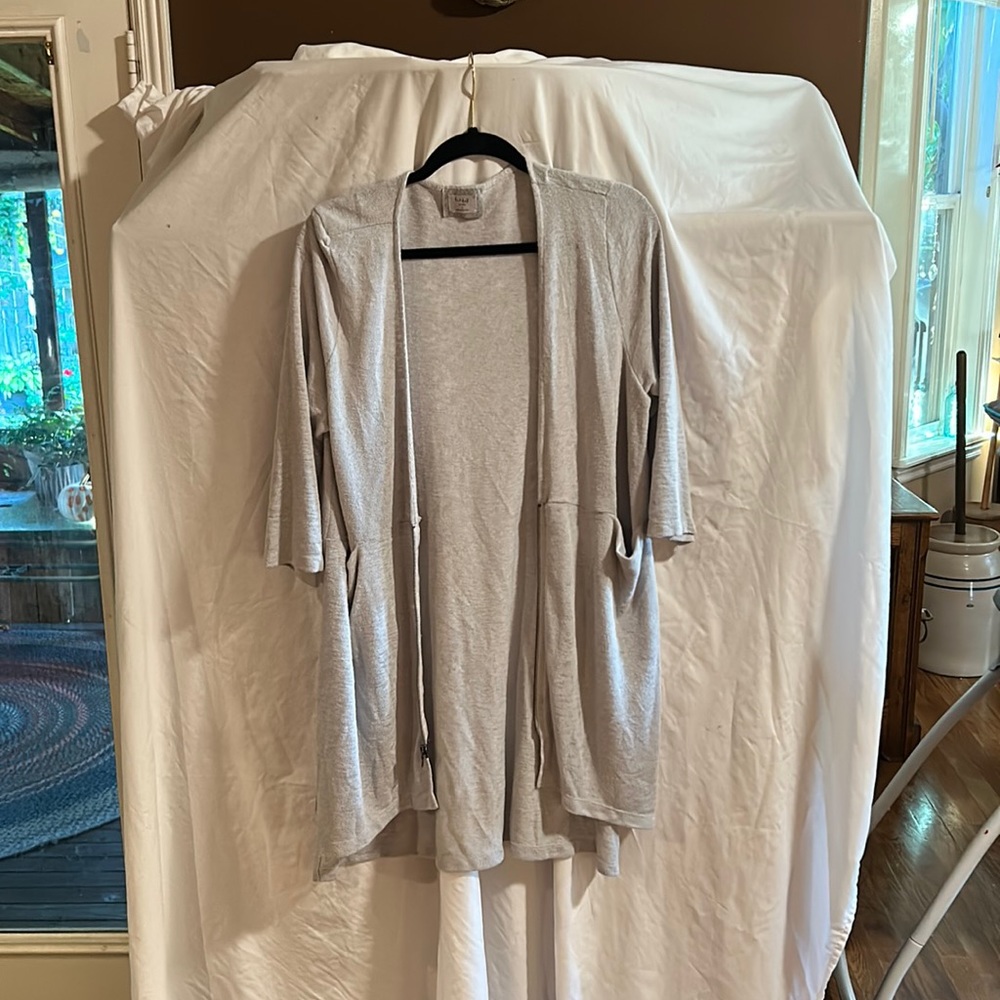 Light gray pocketed and zippered Chalet sweater
